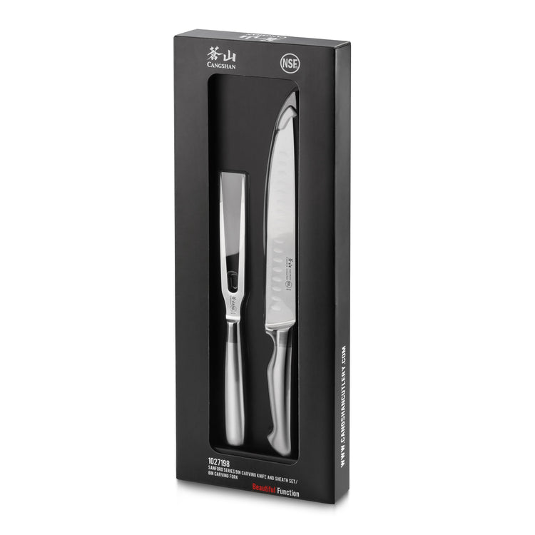 Two-piece carving set with a carving knife and fork, both with stainless steel blades and handles, in black packaging.