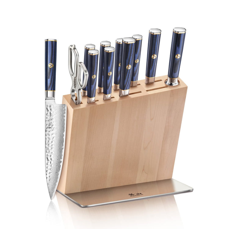 Knife block set with eight knives, kitchen shears, and a wooden block with a metal base.