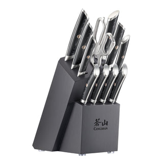 
                    
                      12-piece knife block set with black handles, including chef, paring, utility knives, kitchen shears, and steak knives.
                    
                  