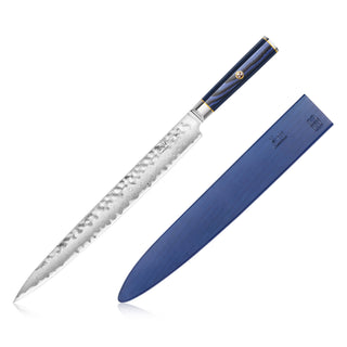 
                    
                      12-inch sashimi knife with patterned blade and blue handle, alongside matching blue sheath.
                    
                  