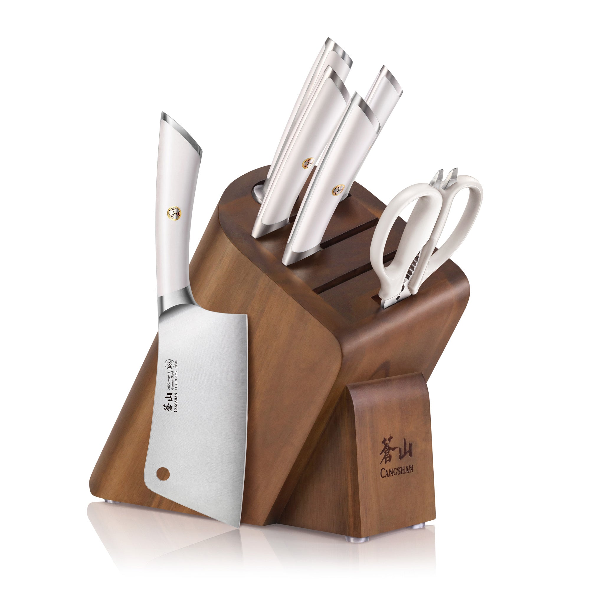 Wooden knife block set with four stainless steel knives and kitchen scissors, angled display on white background.