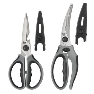 
                    
                      Two gray heavy-duty kitchen shears with black handles, each paired with a black protective guard.
                    
                  