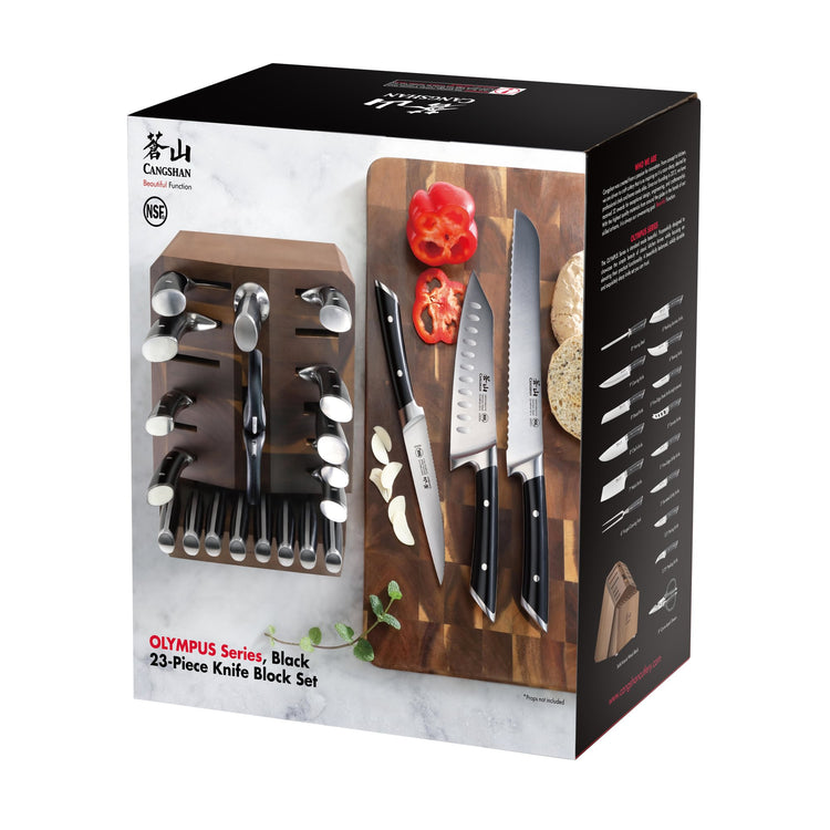 23-piece knife set with wooden block, featuring various knives with black handles displayed on a cutting board with sliced ve