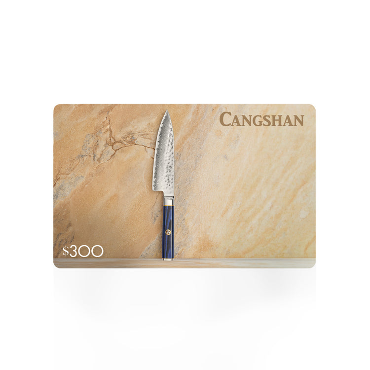 Cangshan $300 gift card featuring an upright kitchen knife with a blue handle on a tan stone background.