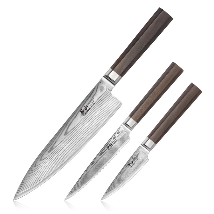 Three kitchen knives with patterned Damascus steel blades and dark wooden handles arranged side by side.