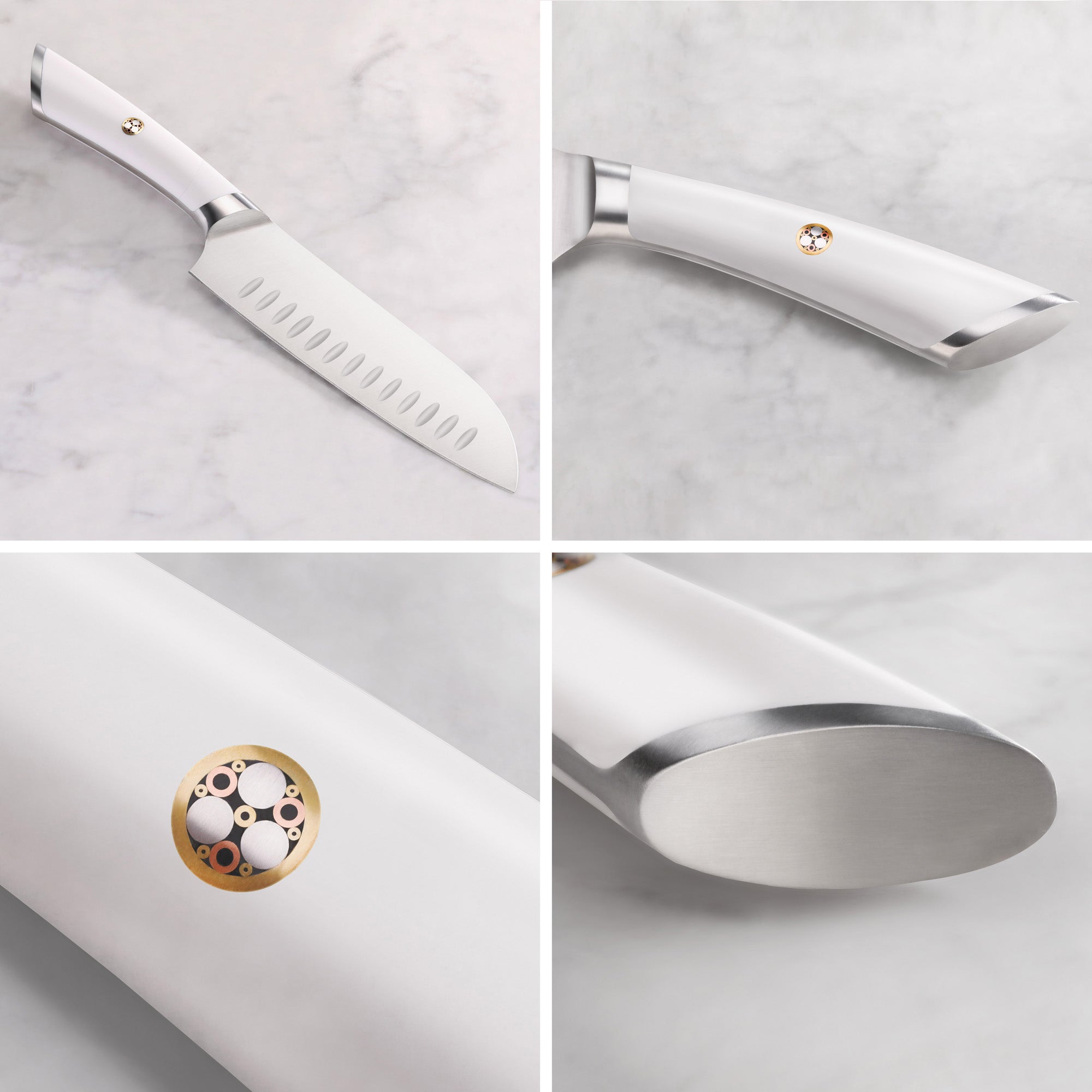 White-handled Santoku knife with a stainless steel blade featuring hollow edge indentations and a decorative circular emblem