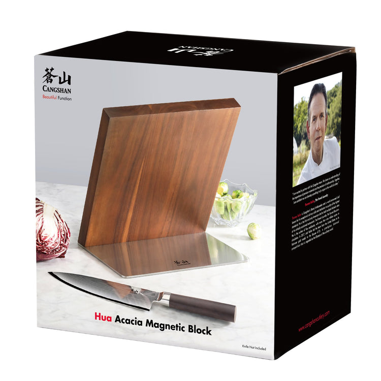 Magnetic knife block with acacia wood surface and stainless steel base, displayed with a chef's knife on a countertop.
