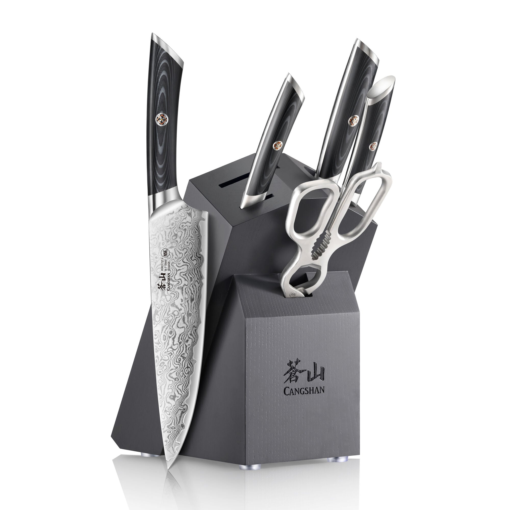 Six-piece knife set with patterned blades, black handles, scissors, and a black angled block with "CANGSHAN" logo.