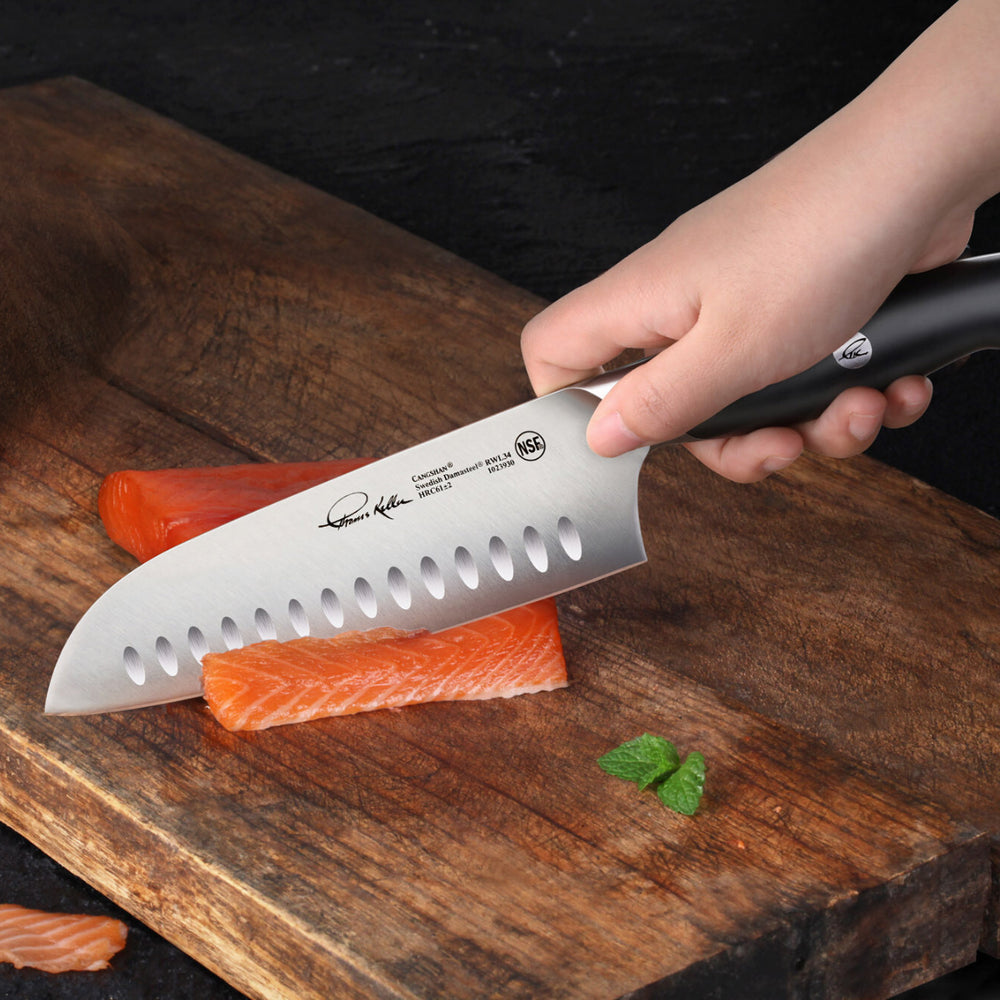 
                  
                    Load image into Gallery viewer, TKSC 7-Inch Santoku Knife, Forged Swedish Powder Steel, Thomas Keller Signature Collection, 1023930
                  
                