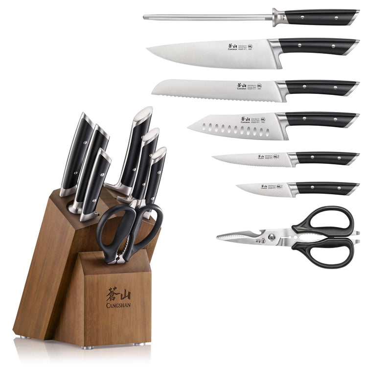 Eight-piece knife set with various blade types, kitchen shears, and a wooden block with handles facing up.