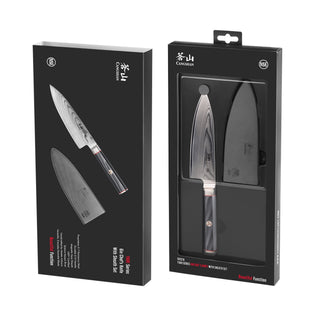 
                    
                      6-inch chef's knife with patterned Damascus steel blade and black sheath in black retail packaging.
                    
                  