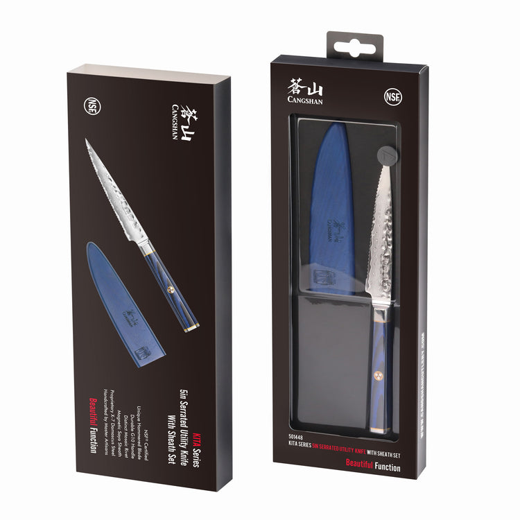 Serrated utility knife with blue sheath and handle, displayed in black packaging with branding and product details.