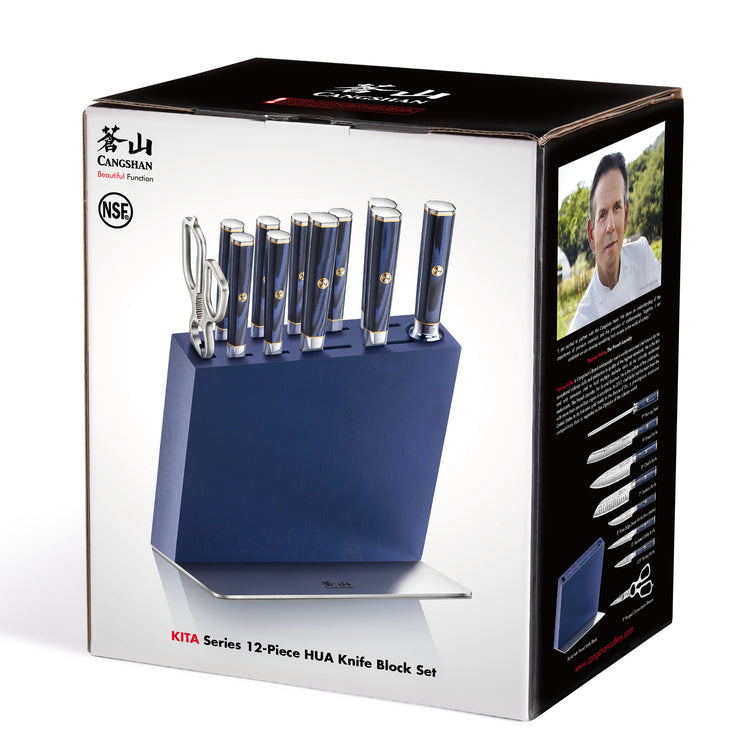 Blue knife block holding eight knives and kitchen shears with blue handles, displayed on product packaging.