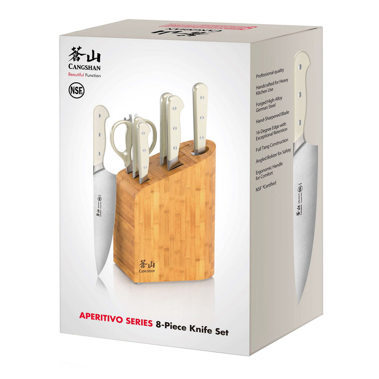 8-piece knife set with bamboo block, including chef knife, paring knife, utility knife, bread knife, and kitchen scissors.