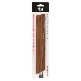 
                    
                      Solid ash wood magnetic knife sheath holding a slicing knife, packaged with a black and white label.
                    
                  