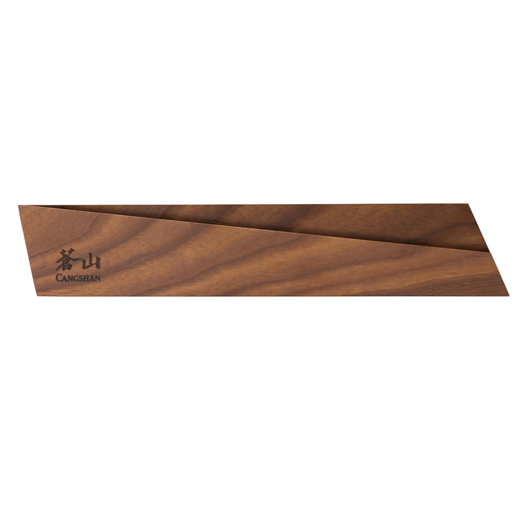 Ash wood magnetic knife sheath with a smooth finish and angled design, featuring a small logo on one end.