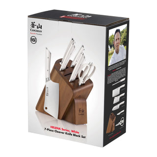 
                    
                      7-piece cleaver knife set with white handles in a brown acacia wood block, including scissors and a cleaver.
                    
                  