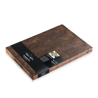 
                    
                      Walnut end-grain cutting board with dark wood pattern and black label from Thomas Keller Signature Collection
                    
                  