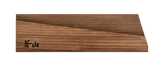 
                    
                      Solid ash wood magnetic knife sheath with a smooth finish and a small black logo on the bottom left corner.
                    
                  