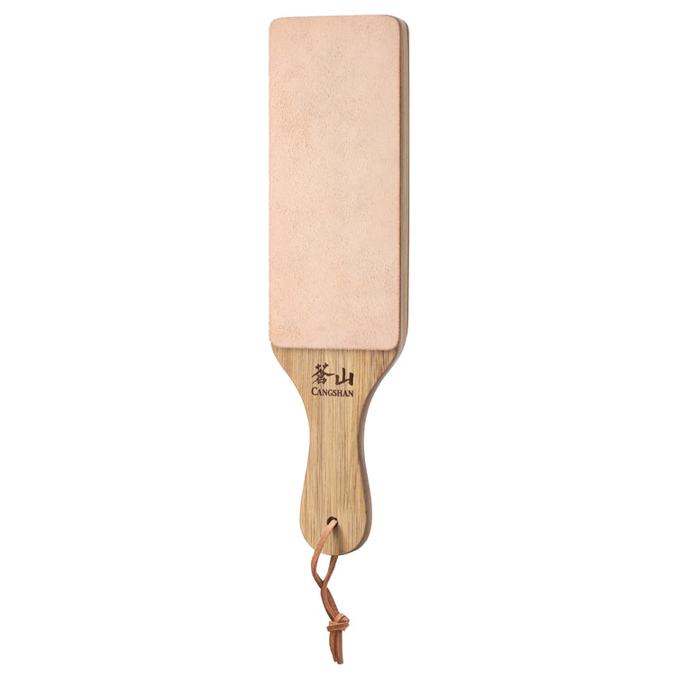 Rectangular paddle strop with light leather surface and wooden handle featuring a hanging loop.