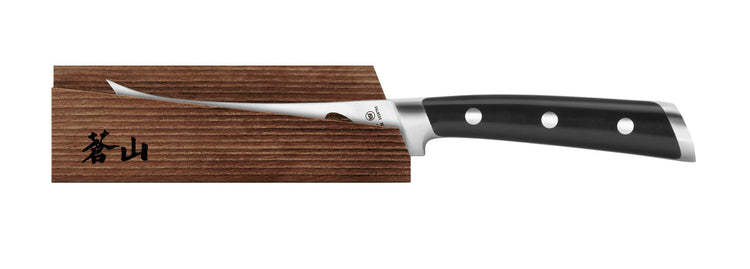 5-inch curved cheese knife with black handle resting on a wooden sheath with black markings.