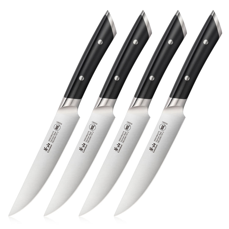 Four steak knives with black handles and stainless steel blades arranged in a row.