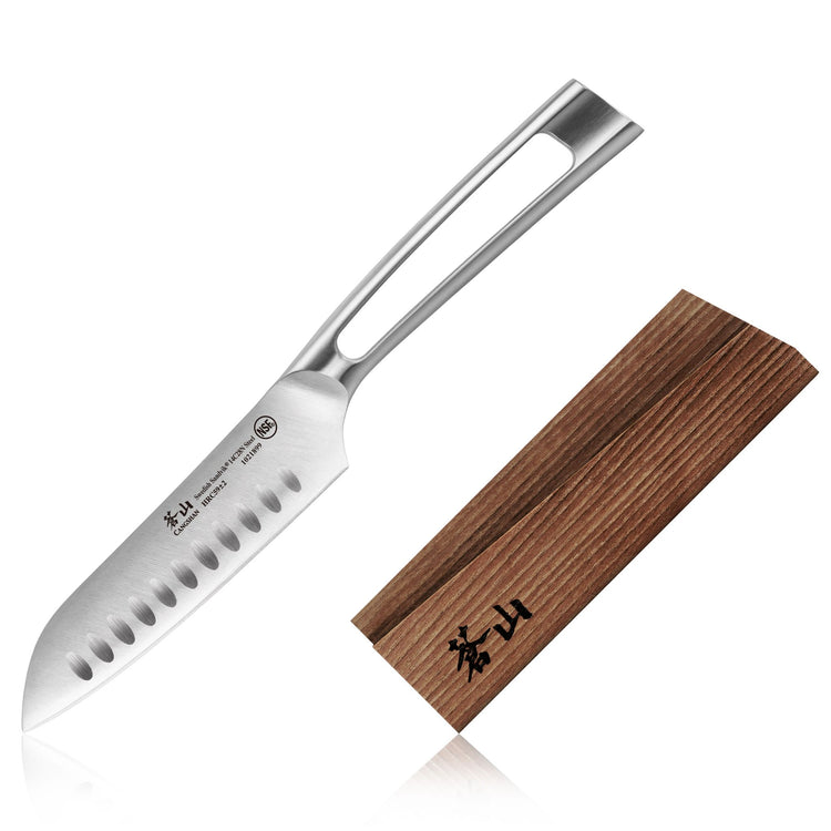 Santoku knife with hollow edge and stainless steel handle next to a wooden sheath with black markings.