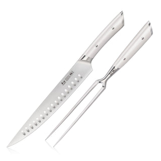 
                    
                      Two-piece carving set with a perforated blade knife and a two-prong fork, both with stainless steel handles.
                    
                  