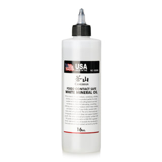 
                    
                      White 16oz squeeze bottle of food contact safe mineral oil with USA flag label and black twist cap.
                    
                  
