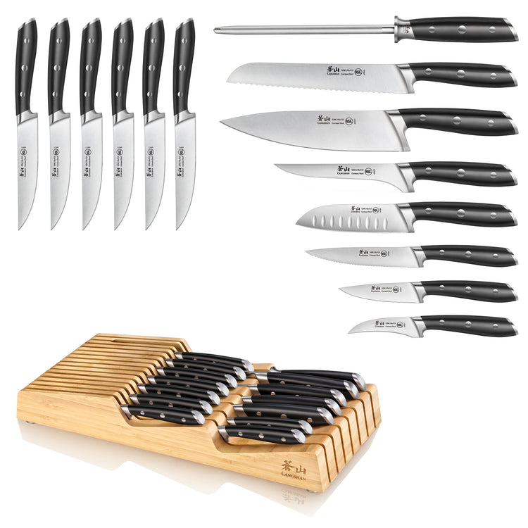 Fifteen black-handled knives including steak, bread, chef, santoku, paring, and honing steel with bamboo in-drawer storage tr