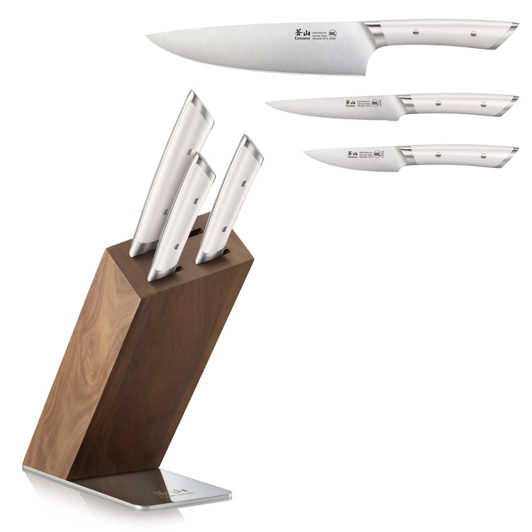 Four stainless steel knives with white handles in and beside a wooden knife block with metal base.