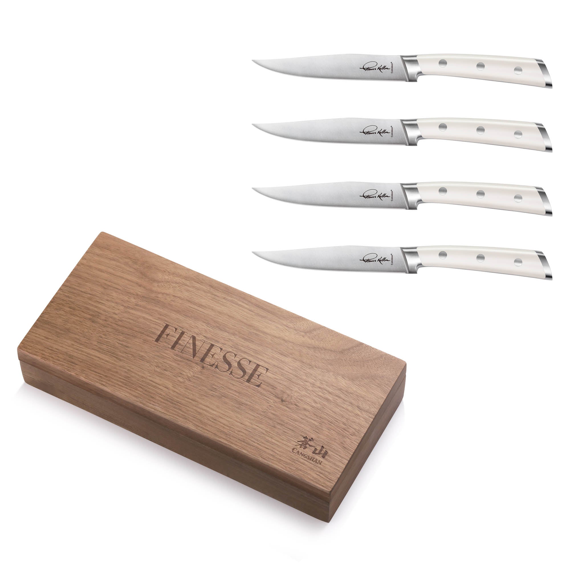 Four white-handled steak knives with straight blades arranged above a closed walnut storage box.