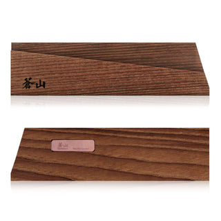 
                    
                      Solid ash wood magnetic knife sheath with angled design and Japanese characters on one side.
                    
                  