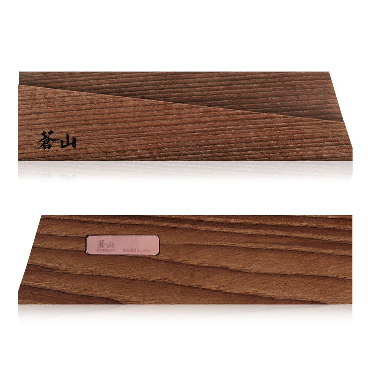 Solid ash wood magnetic knife sheath with angled design and Japanese characters on one side.