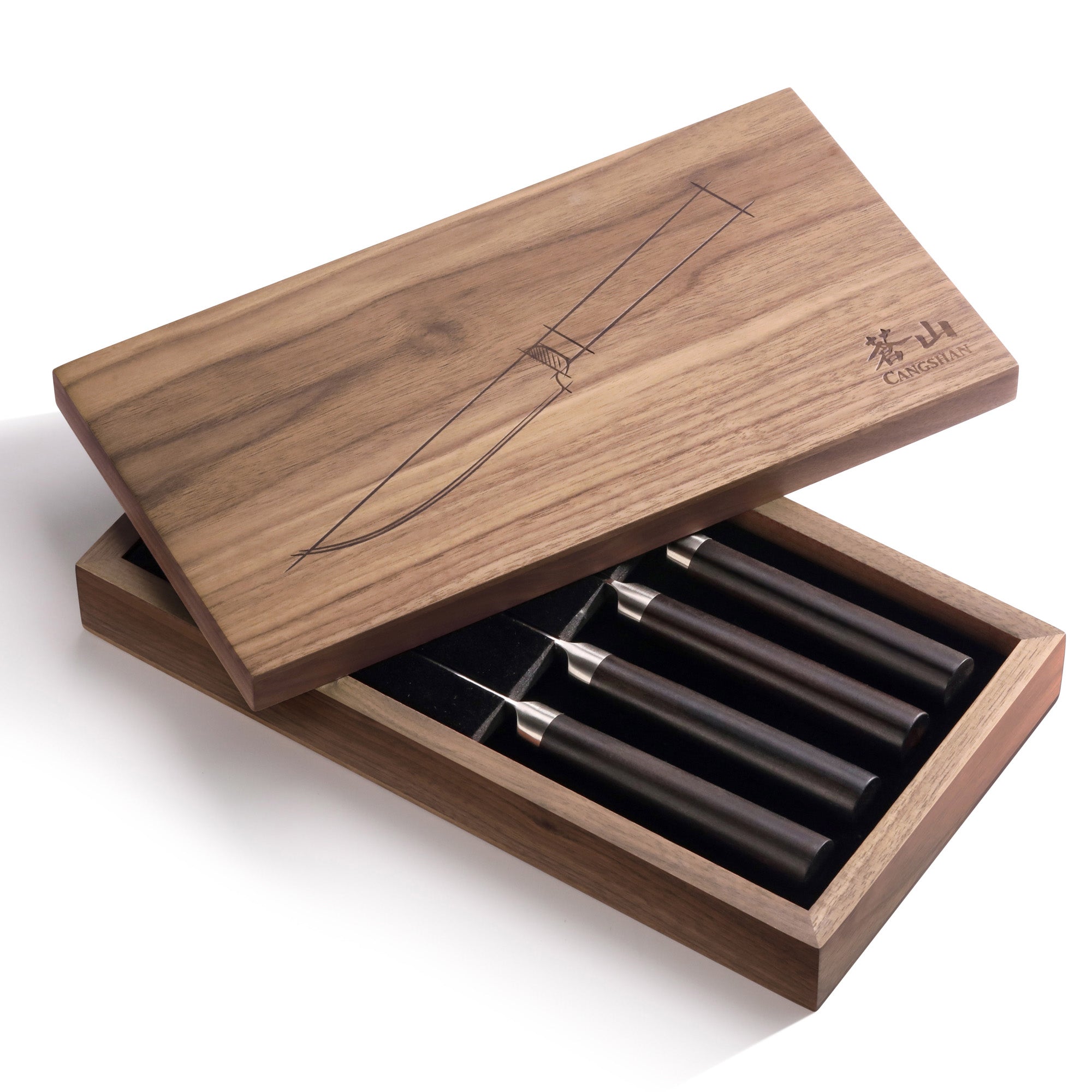 Wooden box with engraved knife outline partially open, showing four steak knives with dark handles inside.