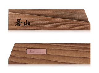 
                    
                      Rectangular solid ash wood magnetic knife sheath with Japanese characters on one side and a small label on the other.
                    
                  