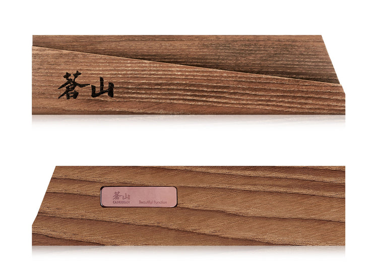 Rectangular solid ash wood magnetic knife sheath with Japanese characters on one side and a small label on the other.