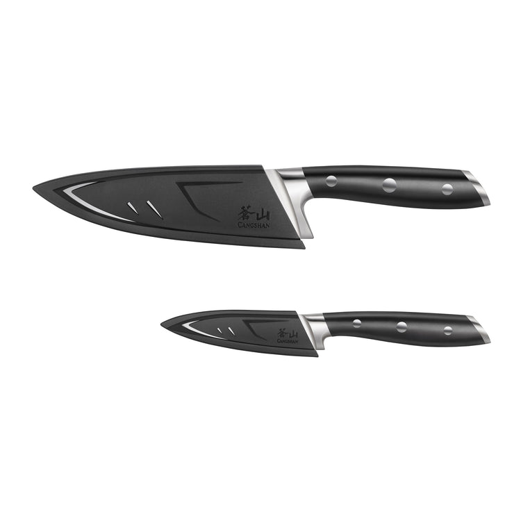 Two black-handled kitchen knives with protective sheaths, one larger chef knife and one smaller paring knife.
