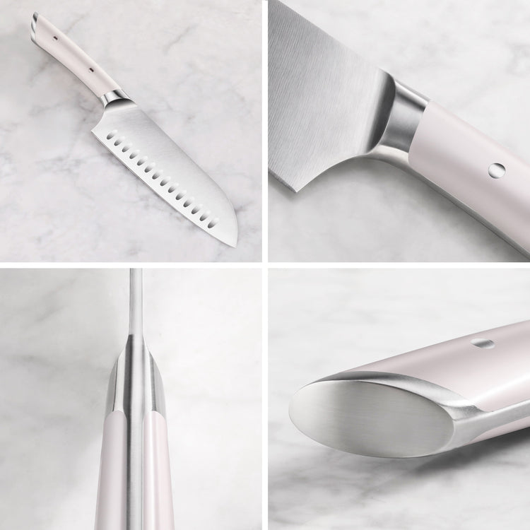 Santoku knife with white handle and stainless steel blade shown from multiple close-up angles on a marble surface.