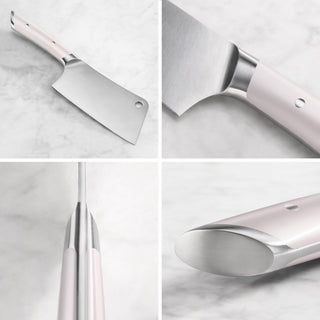 
                    
                      Cleaver knife with white handle and stainless steel blade shown from multiple close-up angles on a marble surface.
                    
                  