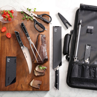 
                    
                      9-piece BBQ knife set with black handles, including carving knife, fork, scissors, sharpening steel, and black carrying case.
                    
                  