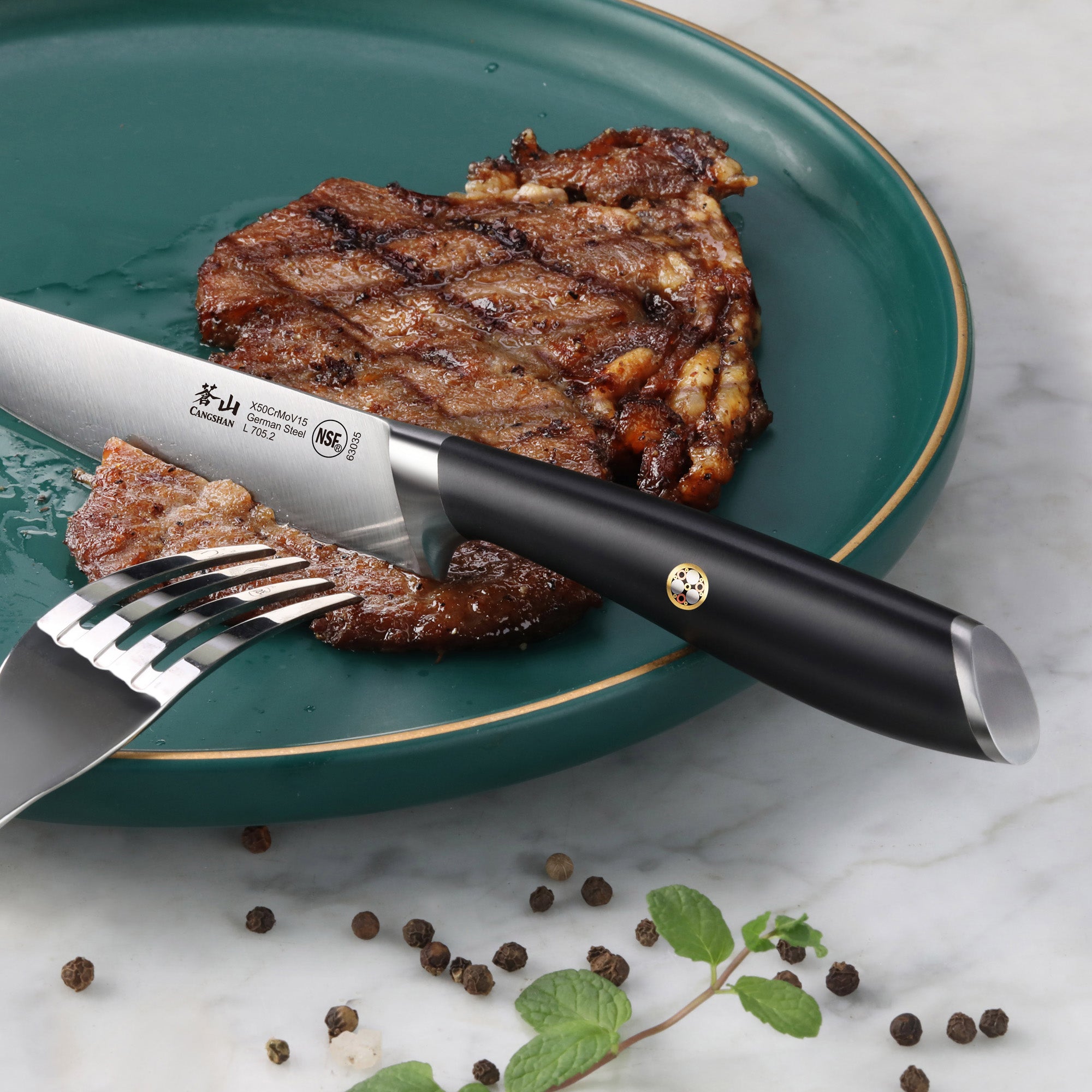 Grilled steak on a green plate with a fork and a black-handled steak knife cutting a piece.