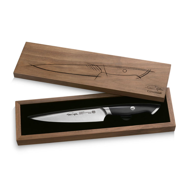 7-inch utility knife with black handle in a wooden box featuring a knife outline and signature engraving.