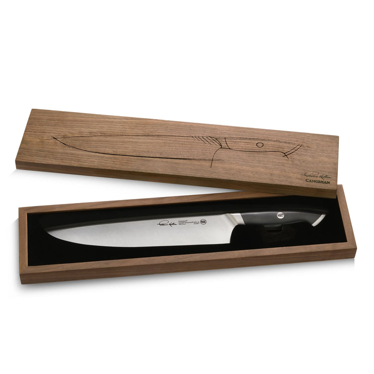 10-inch chef's knife with black handle in a wooden box featuring a knife outline engraving on the lid.