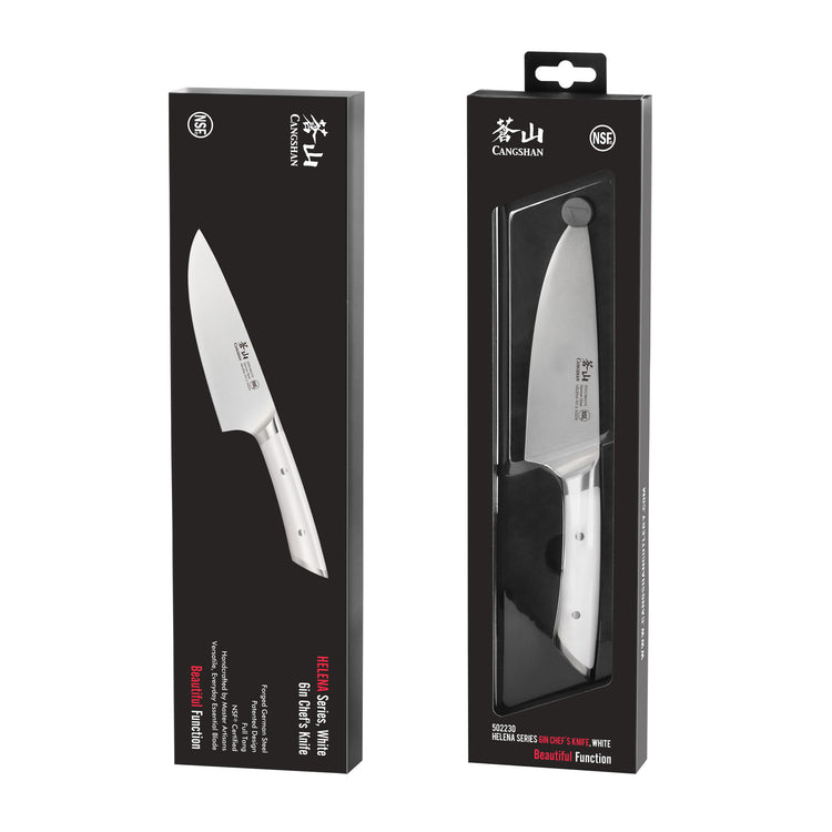 Two black rectangular boxes displaying a 6-inch chef's knife with a silver blade and white handle, one box showing the knife
