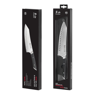 
                    
                      Two black rectangular boxes each containing an 8-inch chef's knife with a black handle and a blade with dimples.
                    
                  