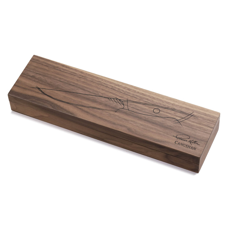 Rectangular wooden box with engraved outline of a steak knife and signature on the lid.