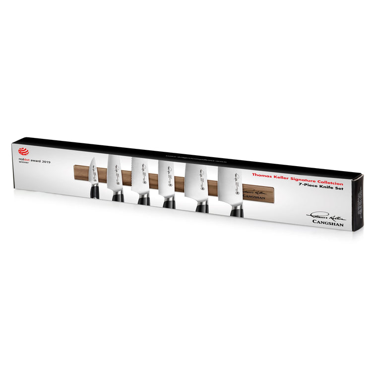 TKSC 7-piece magnetic knife set with black handles and forged Swedish powder steel blades displayed on a wooden magnetic stri