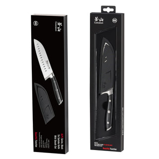 
                    
                      Two boxed Santoku knives with black handles and protective sheaths, displayed vertically against a white background.
                    
                  
