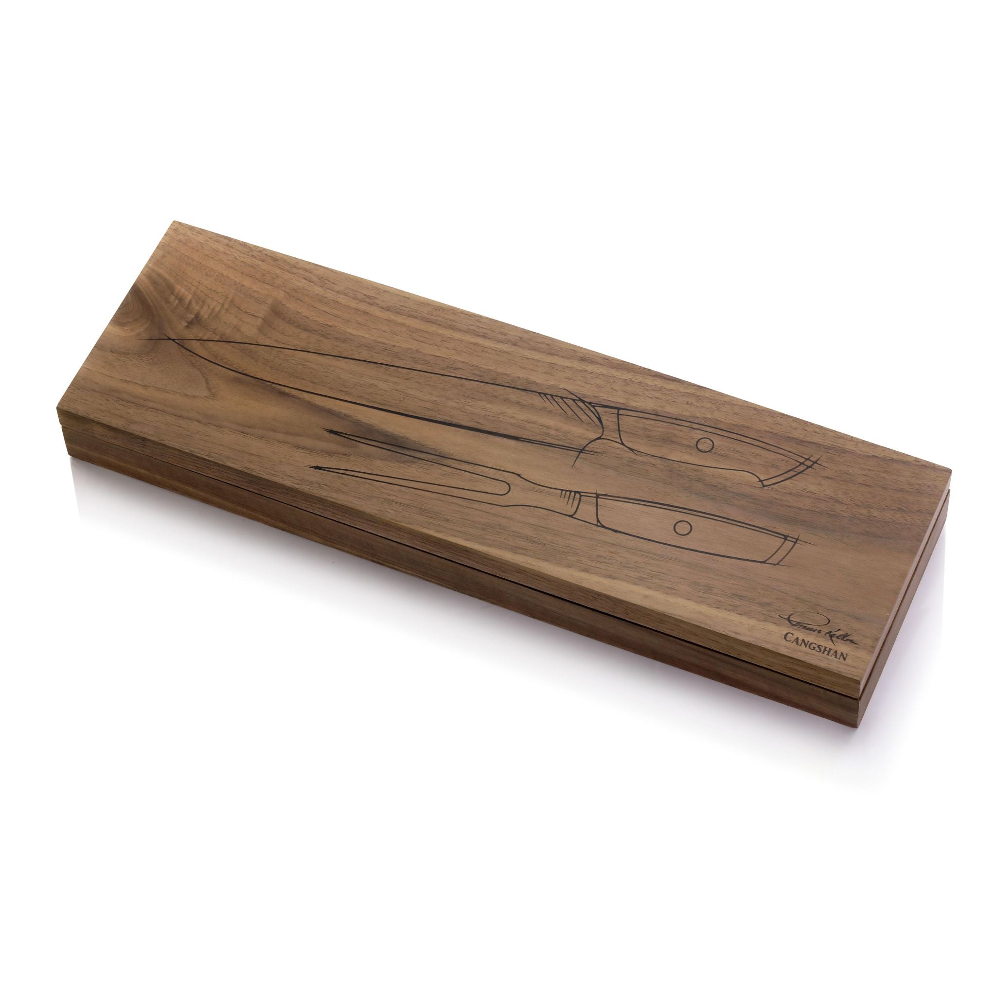 Wooden box with engraved outlines of a carving knife and fork, signed by Thomas Keller.